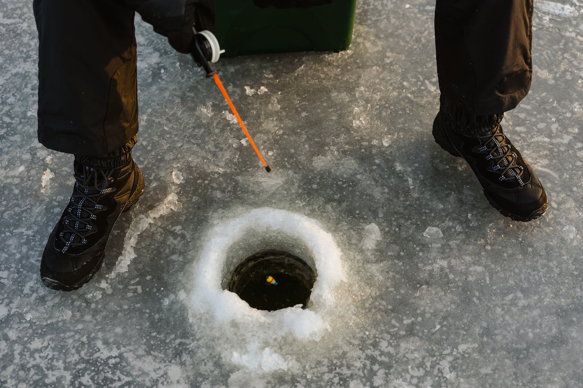 cold glacier snow fishing with bobbers